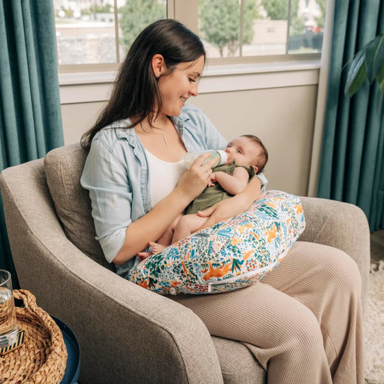 Mother Bottle Feeding Baby