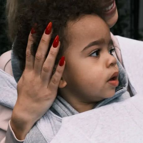 Baby closeup in a Boppy Carrier
