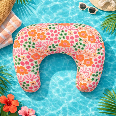 Boppy Nursing Pillow with a colorful flowery pattern